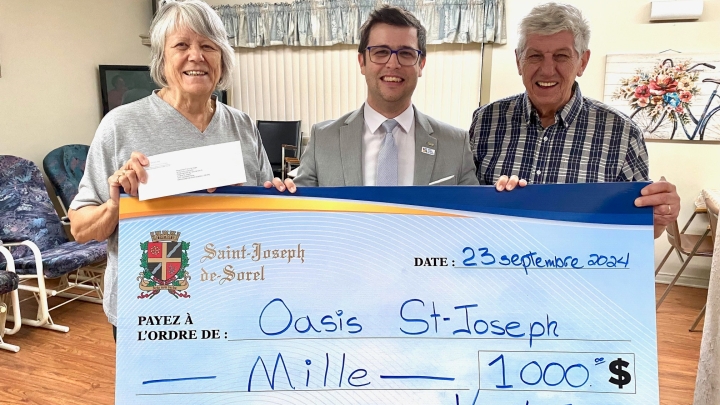 Remise d'une contribution financière à l'Oasis