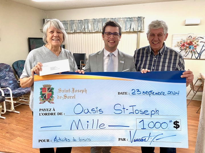 Remise d'une contribution financière à l'Oasis